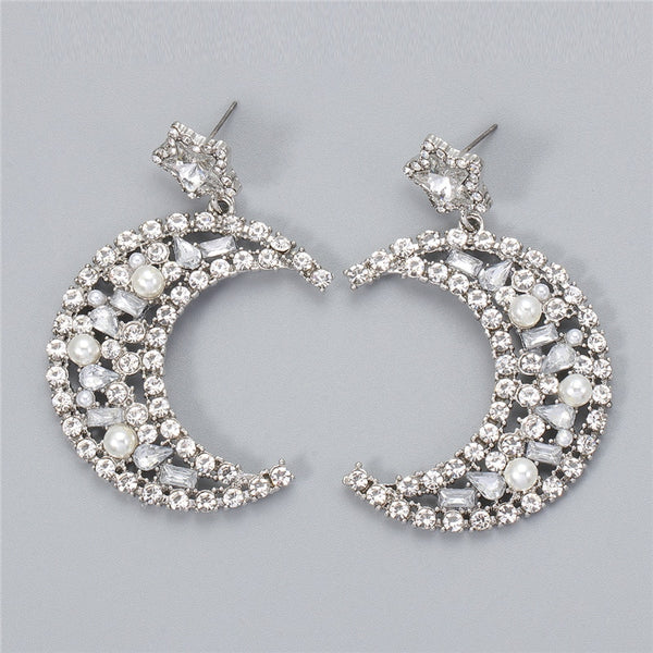 Pendientes colgantes de luna nueva de moda para mujer, pendientes sencillos con diamantes de imitación.
