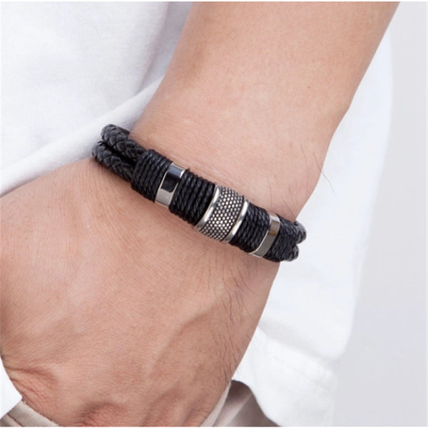 Pulsera de cuero tejida de acero inoxidable con dije magnético para hombre.