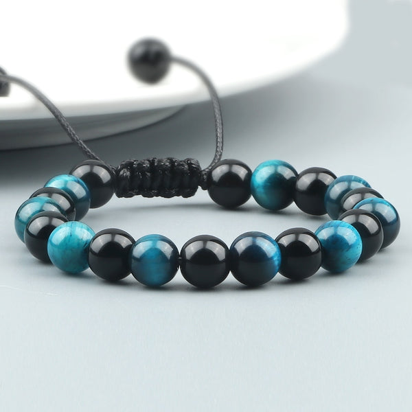 Pulsera de piedra de ojo de tigre azul de alta calidad con cuentas de ónix trenzadas de tamaño ajustable.