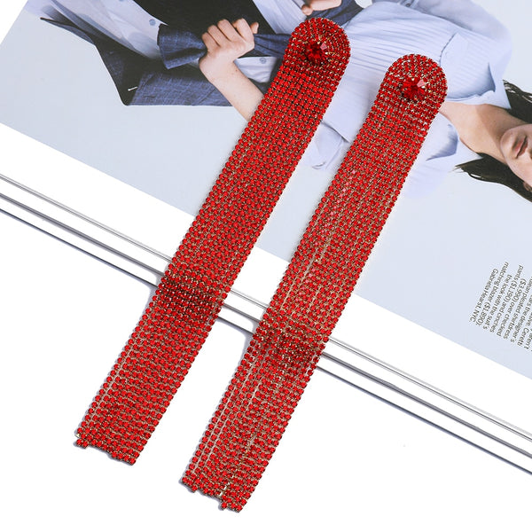 Elegantes pendientes largos con borlas dulces