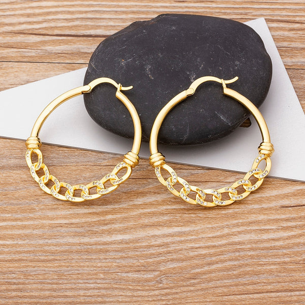 Pendientes circulares grandes con brillantes y diamantes de imitación de moda.