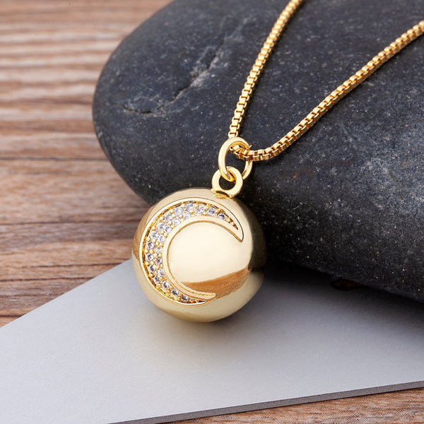 Nuevo colgante con forma de bola europea y americana con diseño de luna para mujer