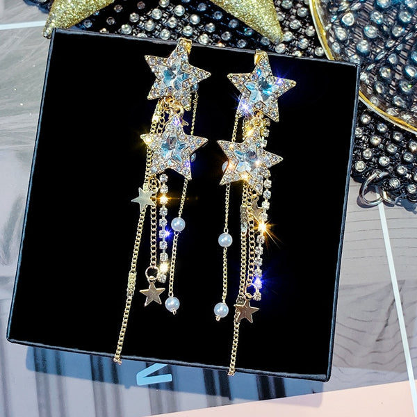 Pendientes colgantes de estrella de estilo coreano para mujer, nuevos pendientes largos con borlas y cristales azules brillantes.