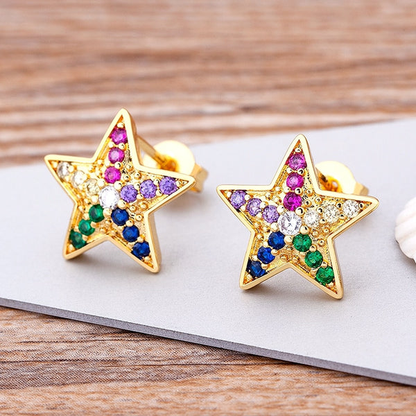 Nuevo diseño de 30 estilos de pendientes de estrella dorados con diamantes de imitación para mujer