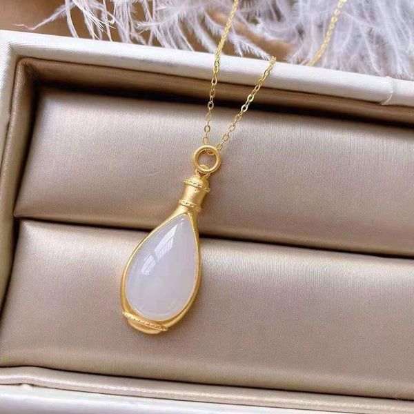 Nuevo collar con colgante de jarrón de jade blanco natural de Hotan con incrustaciones de plata