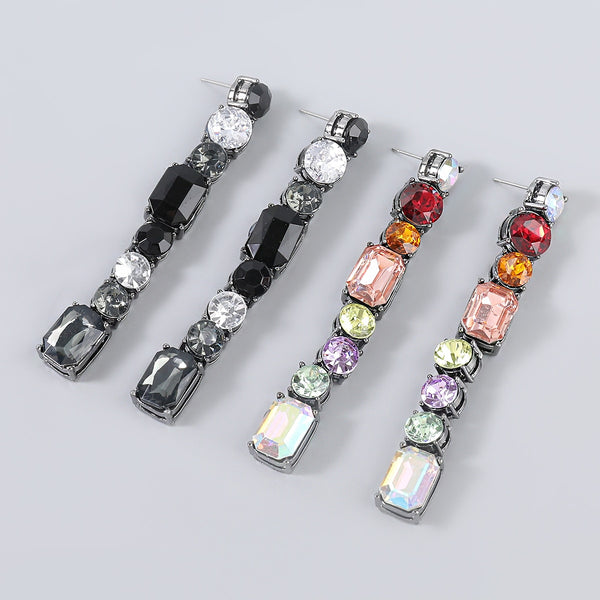 Pendientes geométricos de metal con diamantes de imitación de Pauli Manfi para mujer