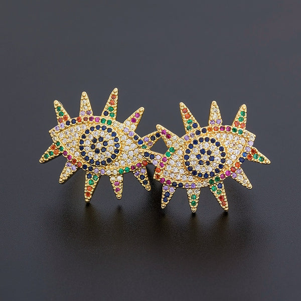 Anillo ajustable de cobre con micropavé de circonita cúbica y arcoíris con diseño de ojo malvado de la suerte.