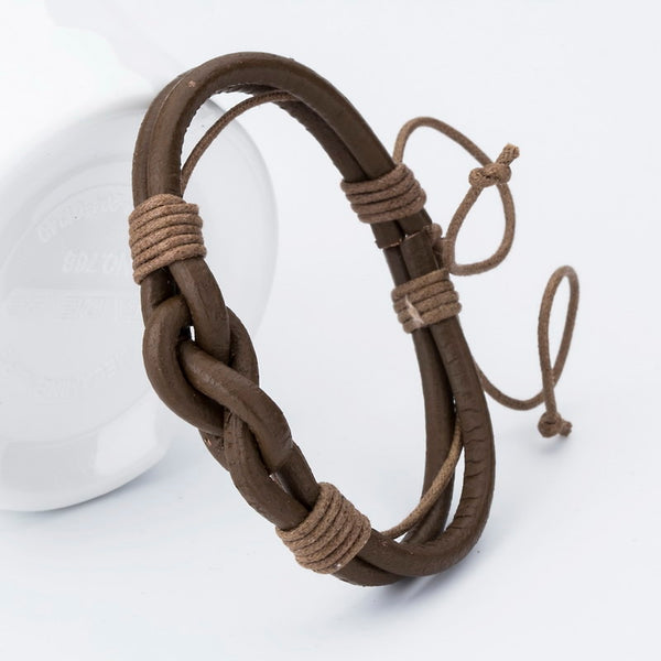 Pulsera trenzada hecha a mano para hombre y mujer, brazalete con dijes, brazalete de cuero trenzado simple y único.