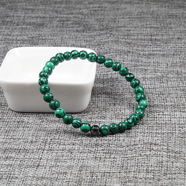 Pulsera de hematita cilíndrica de 6 mm con abalorio de piedra volcánica natural de ojo de tigre para hombres y mujeres.