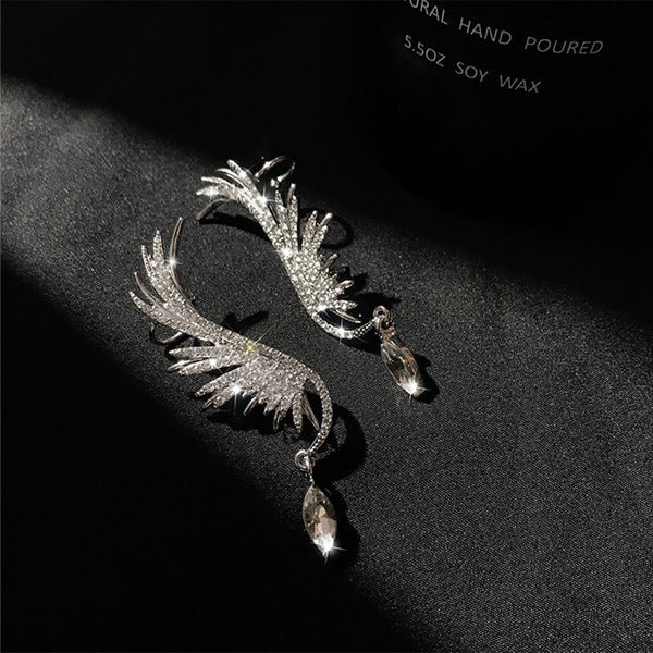 Pendientes colgantes con forma de ala y brillantes de imitación de cristal en forma de gota de agua.