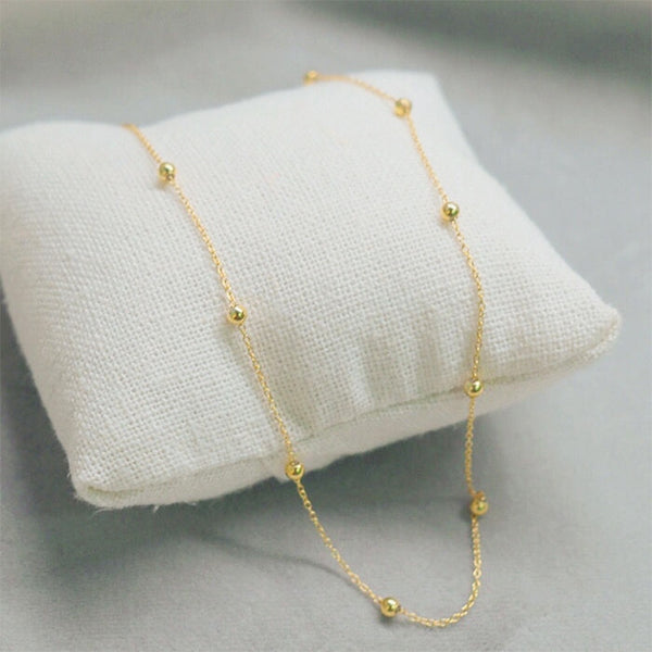 Collar con colgante de bola de acero inoxidable 316L color dorado