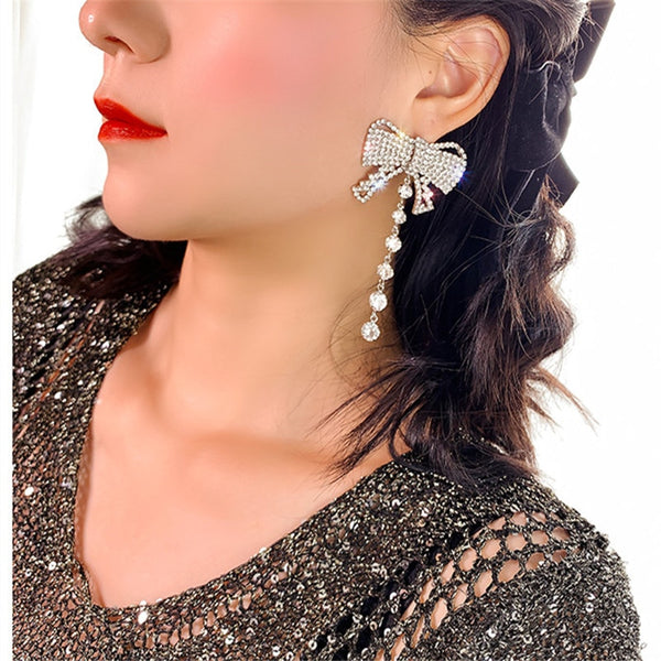 Hermosos pendientes colgantes de mariposa con diamantes de imitación para mujer, pendientes largos de cristal con borlas.