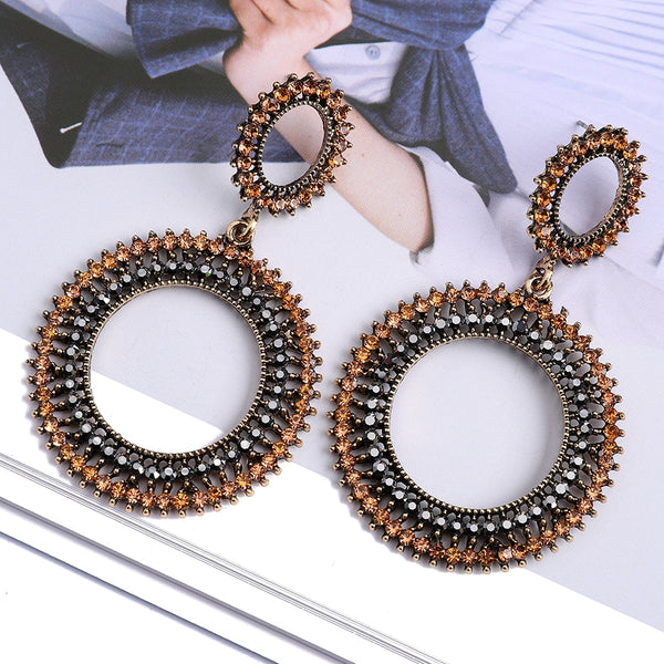 Pendientes colgantes huecos de metal vintage de moda