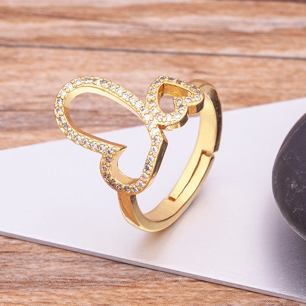 Anillos de compromiso de boda con dije de corazón de amor