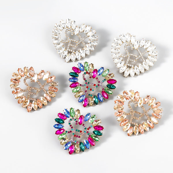 Pendientes Pauli Manfi de metal con letras y corazón de diamantes de imitación para mujer