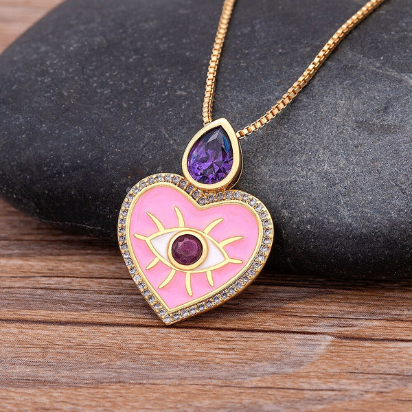 Nuevo collar popular europeo y americano con forma de corazón y ojo malvado con aceite en forma de gota