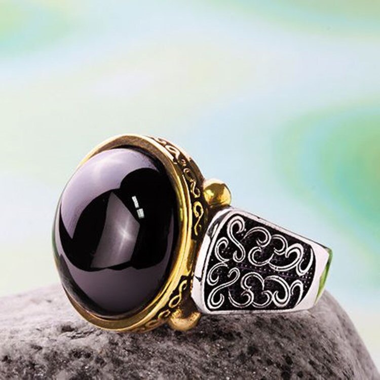 Craved Pattern Black Egg-shaped Crystal Silver Color Ring