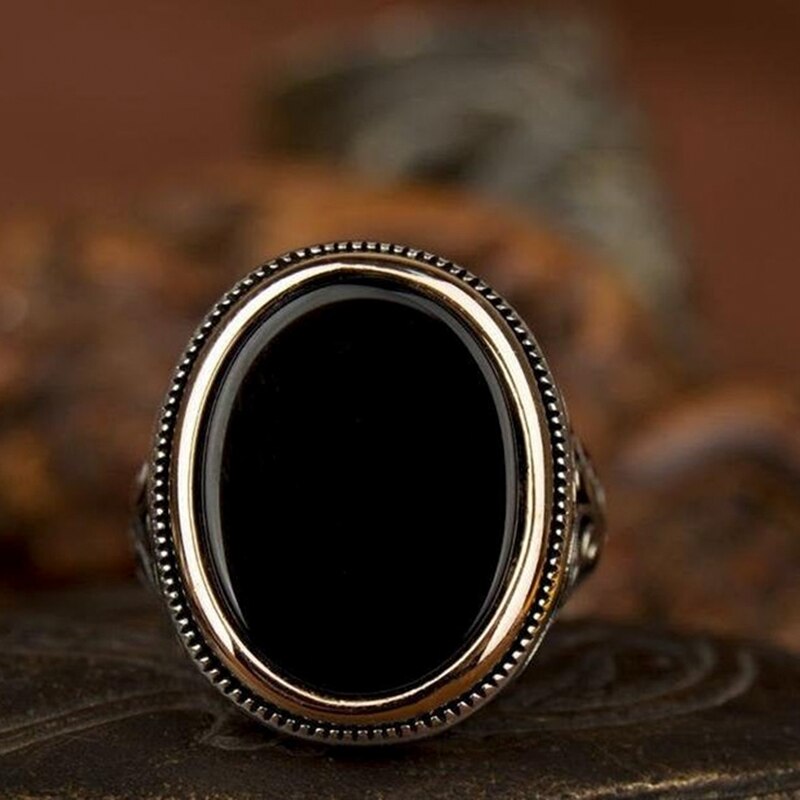 Craved Pattern Black Egg-shaped Crystal Silver Color Ring