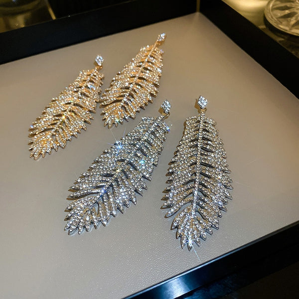 Pendientes colgantes de cristal estilo pluma de moda para mujer