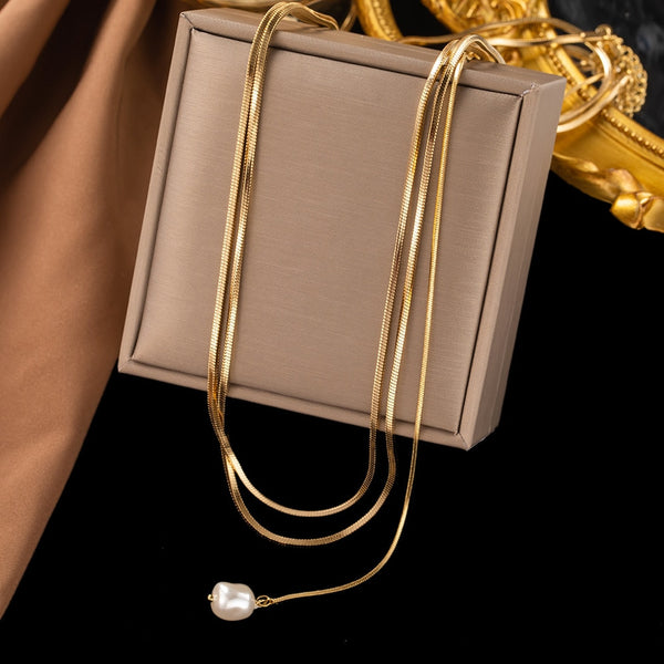 Collar con colgante de perla barroca de cadena extralarga bañada en oro para mujer
