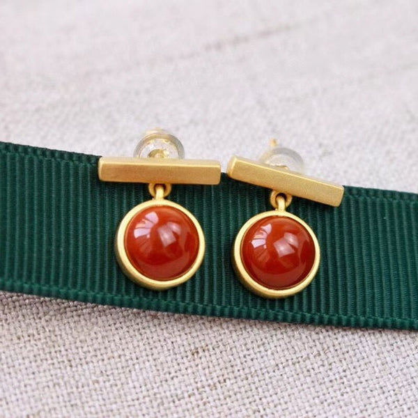 Pendientes redondos de turmalina roja del sur con incrustaciones de oro antiguo