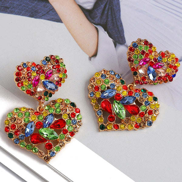 Elegantes y modernos pendientes colgantes de doble corazón para mujer.