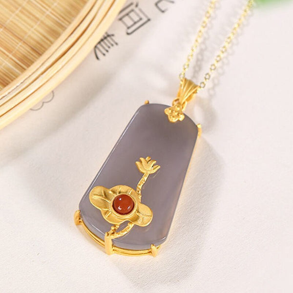 Colgante de collar dorado con loto de jade púrpura ahumado hetian natural, original y nuevo