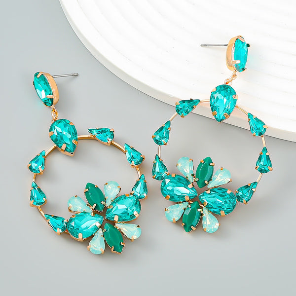 Pendientes de flores con diamantes de imitación redondos de metal de moda para mujer