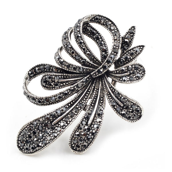 Broches de flores negras con diamantes de imitación para mujer