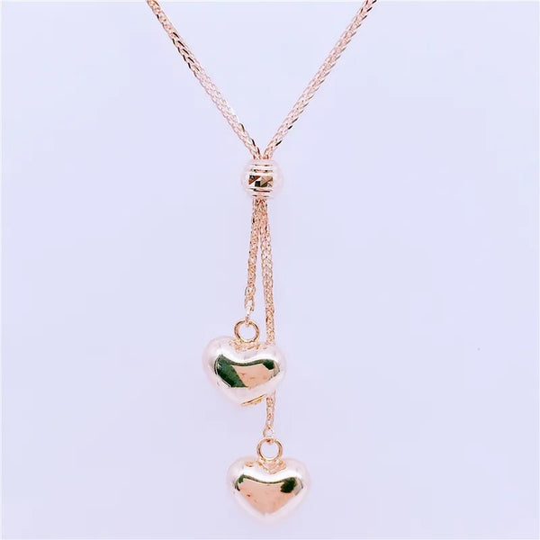 Collar con colgante de corazón de oro morado 585