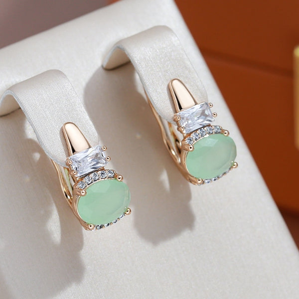 Elegantes pendientes ovalados de circonita verde niebla para mujer