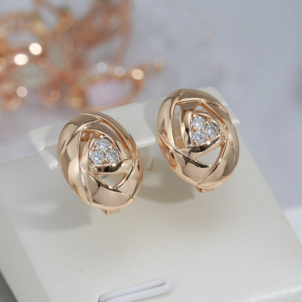 Pendientes ingleses plegables geométricos ovalados de metal brillante