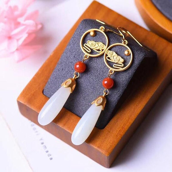 Pendientes largos huecos con forma de gota de agua de jade blanco hetiano natural