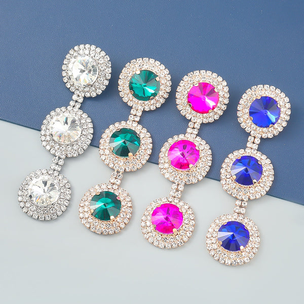 Pendientes colgantes redondos multicapa de cristal y metal con diamantes de imitación de Pauli Manfi