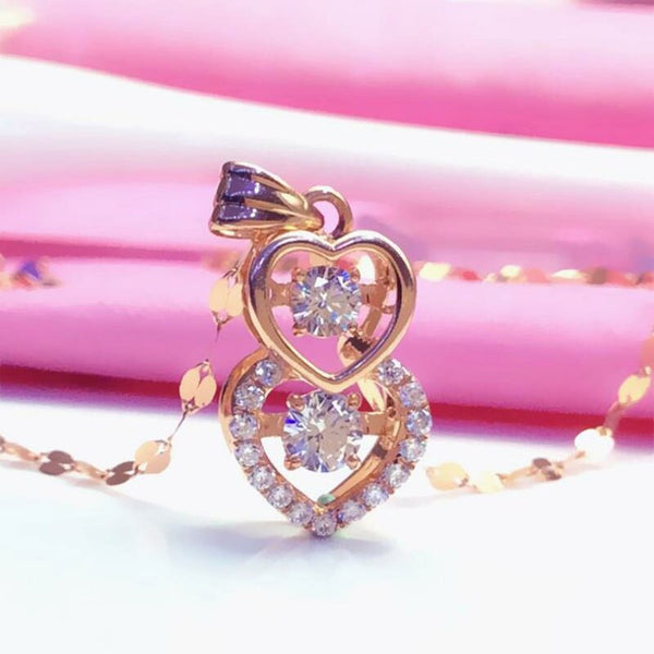 Collar con colgante de doble corazón de oro púrpura 585 y cristales brillantes de oro rosa de 14 quilates.