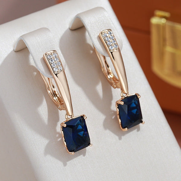 Pendientes vintage de oro rosa 585 con circonitas naturales y piedra azul grande