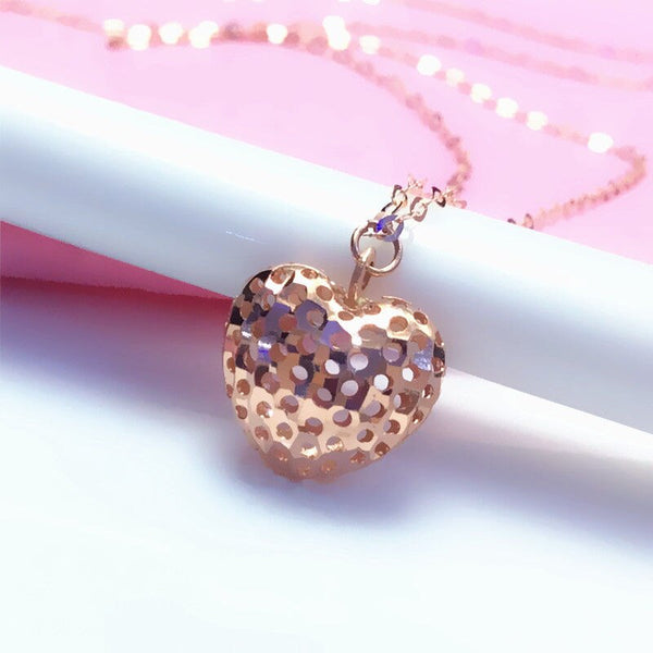 Collar con colgante de corazón tridimensional en oro púrpura 585