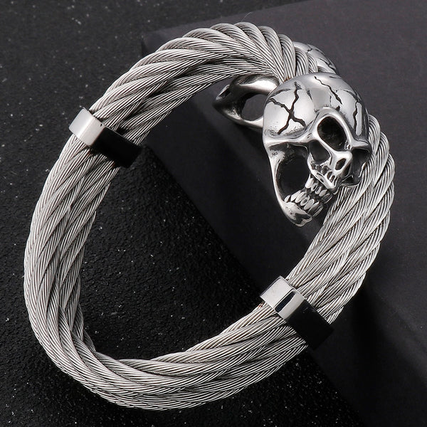 Brazalete abierto con calavera y cable trenzado para hombre