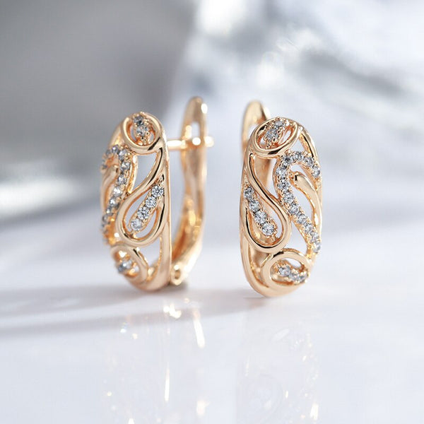Pendientes de clip con textura hueca y circonita blanca para mujer