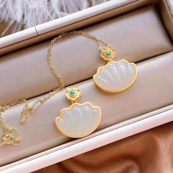 Nuevo collar con colgante de concha de jade hetiano natural con incrustaciones de plata