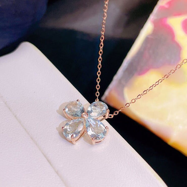 Collar para mujer con colgante de flor de cristal azul y oro rosa con incrustaciones de plata de ley S925