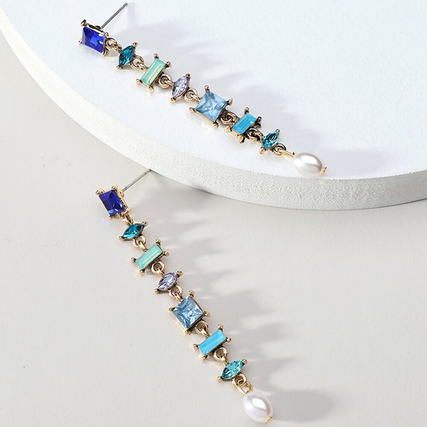 Pendientes largos con borlas y perlas de imitación de moda
