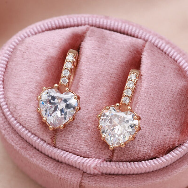 Pendientes colgantes de oro rosa con forma de corazón y corte de circonita grande de New Trend Jewelry
