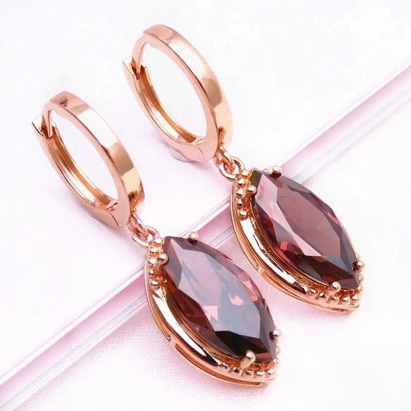 Pendientes de oro rosa con piedras preciosas rosas en forma de marquesa para mujer