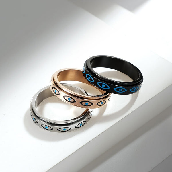Anillos giratorios de acero inoxidable y titanio con forma de ojo de Horus para liberar el estrés.