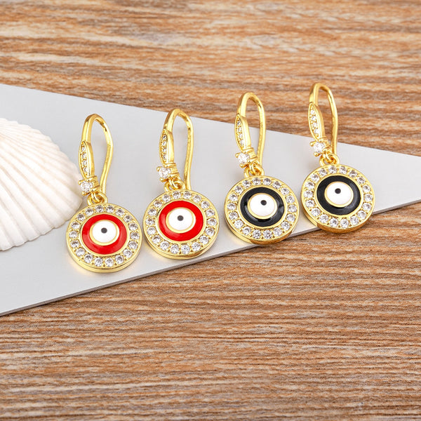 Pendientes redondos de circonita con forma de hamsa y ojo malvado de la suerte
