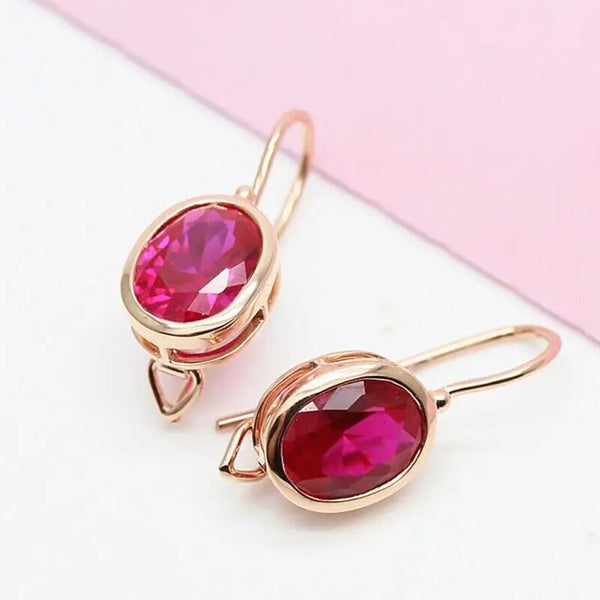 Pendientes de rubí ovalado con incrustaciones de oro rosa de 14 quilates y baño de oro púrpura 585 para mujer