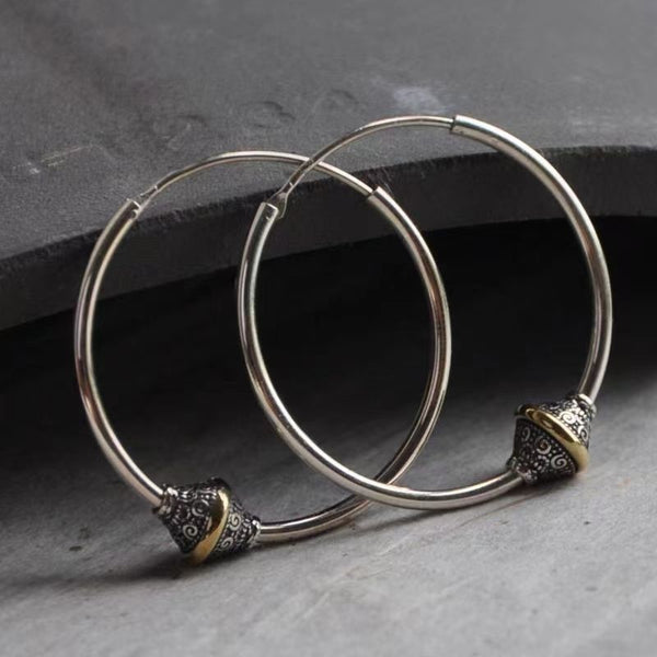 Pendientes de aro originales de estilo nacional de diseñador para mujer.