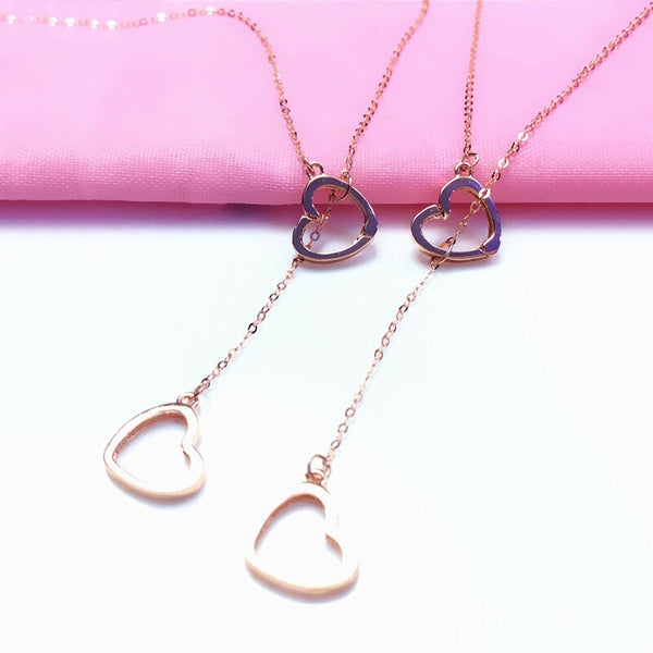 Colgante de borla con forma de corazón hueco en oro púrpura 585