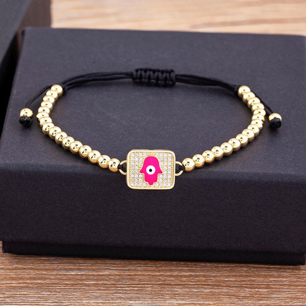 Pulsera de arcoíris con incrustaciones de mal de ojo de niña